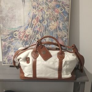 Elegant White and Brown Sunterra Duffel Bag
